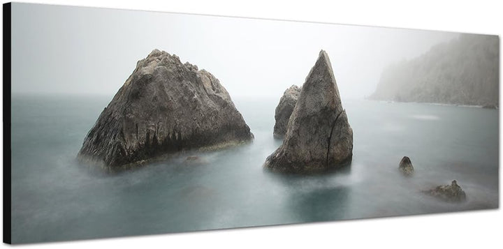 Paul Sinus Art Panoramabild auf Leinwand und Keilrahmen 150x50cm Meer Morgendämmerung Nebel Felsen