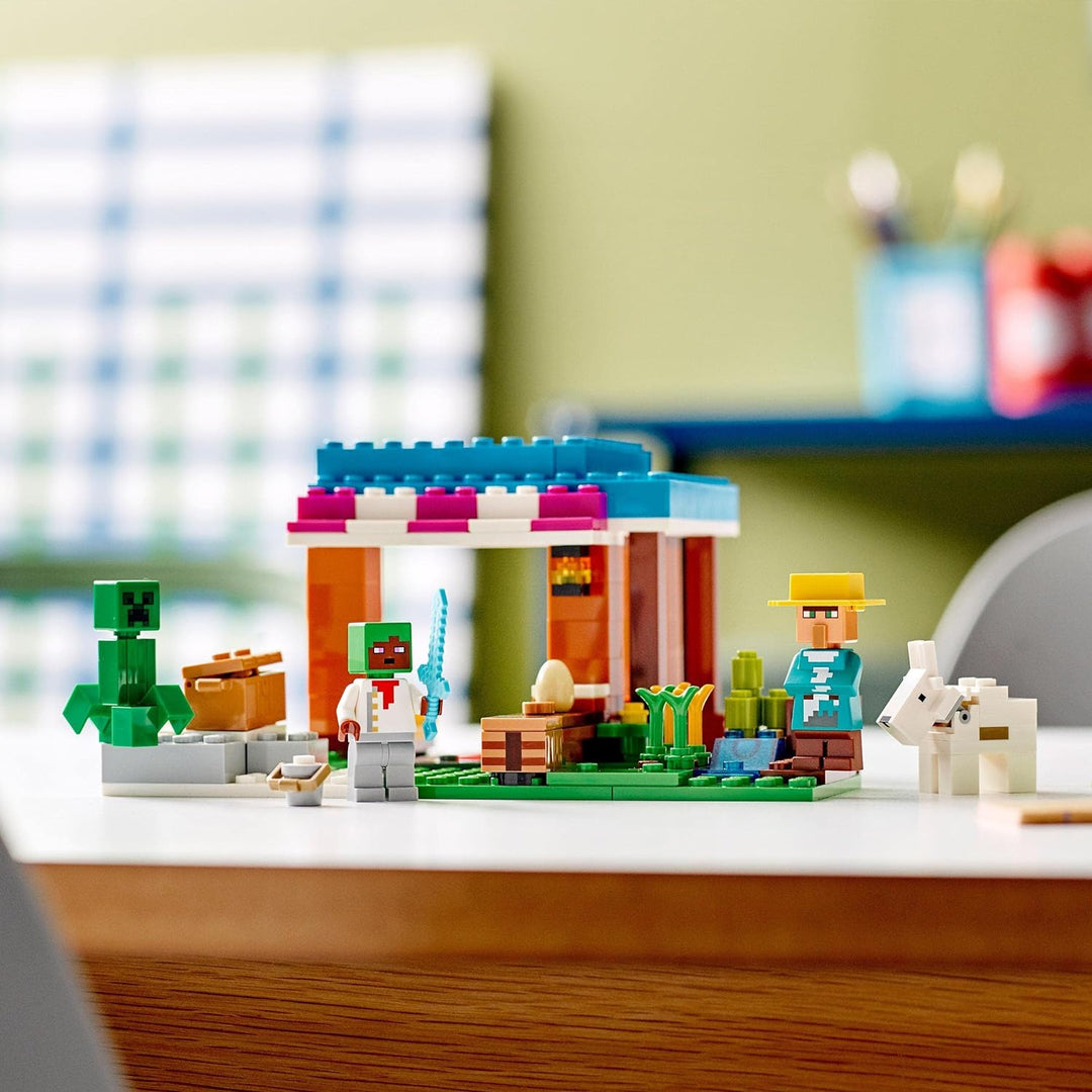 LEGO 21184 Minecraft Die Bäckerei modulares Spielzeug-Set mit Creeper- und Ziege-Figur, Konstruktion
