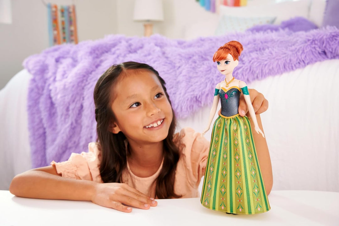 Disney Frozen Disney "Die Eiskönigin" Spielzeug, Anna-Musikpuppe in charakteristischer Kleidung, spi
