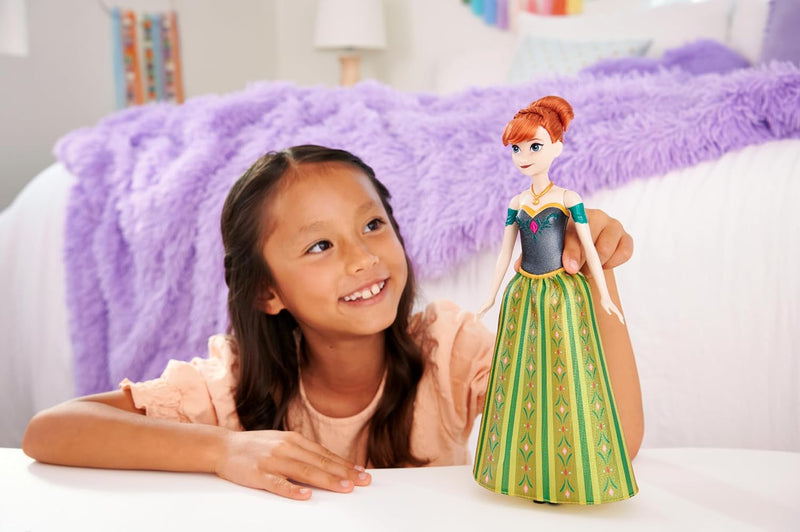 Disney Frozen Disney "Die Eiskönigin" Spielzeug, Anna-Musikpuppe in charakteristischer Kleidung, spi