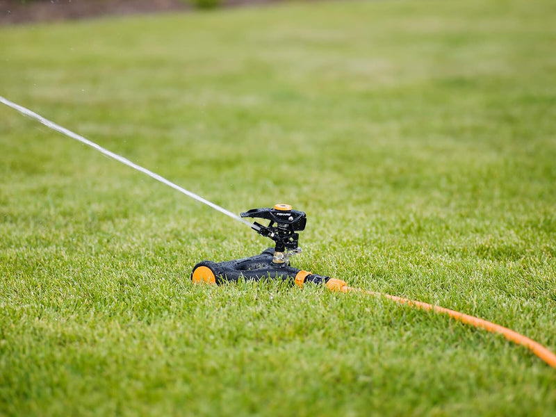 Fiskars Impuls-Sprinkler XL mit Rädern, Mit Abstandsregelung, Sprühbildkontrolle und Rotationskontro