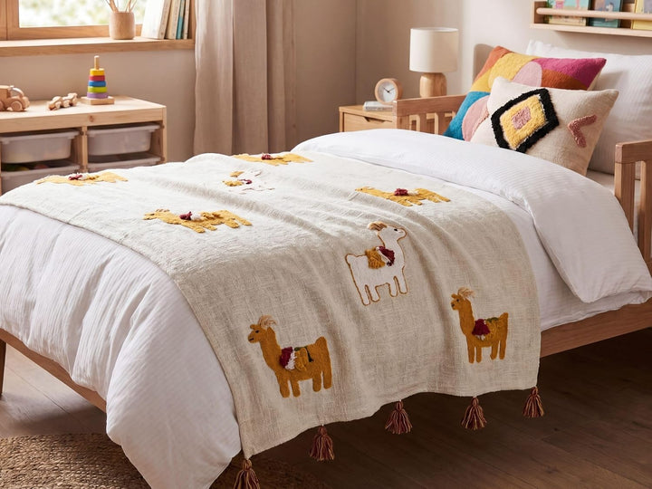 Deko Decke Baumwolle beige/orange mit Lama-Motiv Quasten 130x180 cm Khandwa