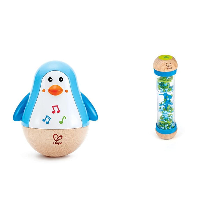 Hape Stehauf-Pinguin | Farbiger Stehauf-Pinguin mit Melodie, Stehauf-Spielzeug für Kinder im Alter v