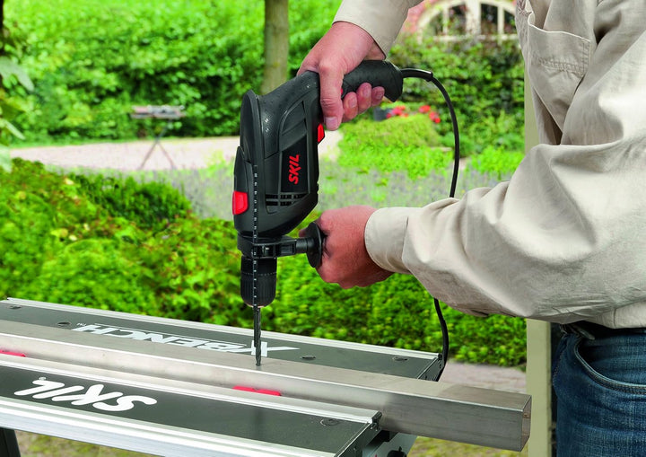 Skil Schlagbohrmaschine 6290 AA (710W, 13mm, Drehzahlvorwahl, +Tiefenanschlag, + 3 tlg. Bohrerset) I