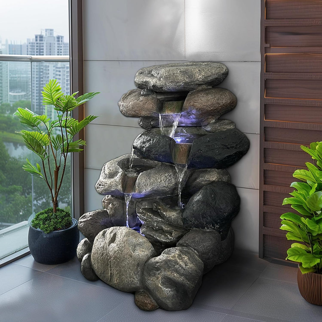 Köhko Springbrunnen Kieselstein Gartenbrunnen in Naturstein-Optik mit 4X LED Beleuchtung Höhe=68 cm