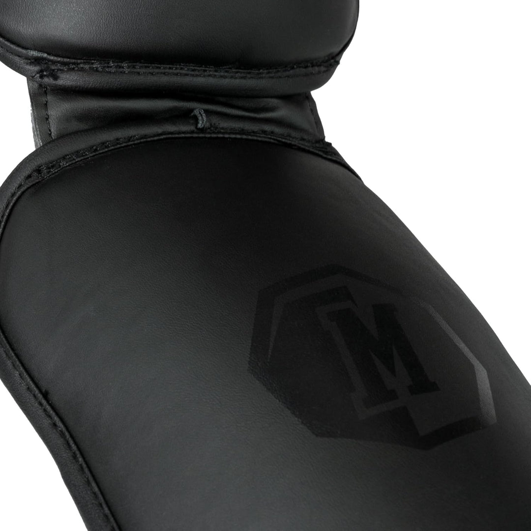 MADGON Schienbeinschoner mit perfektem Sitz und Dicker Polsterung - Schienbeinschutz für Kampfsport,