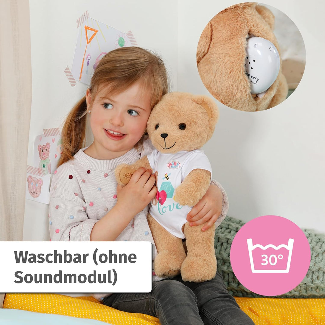 BABY born Singender Teddy, Plüschbär mit Soundfunktion, weissem Strampler und beweglichen Armen und