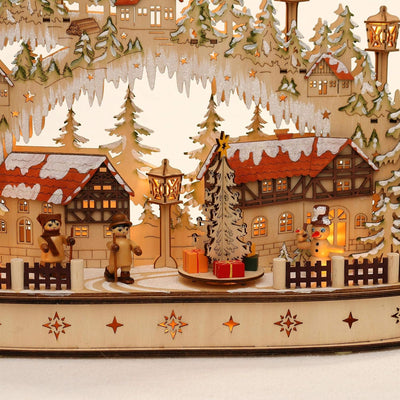 Dekohelden24 LED Holz Schwibbogen mit bewegtem Weihnachtsbaum, Motiv: Schneemann und Wanderfiguren,