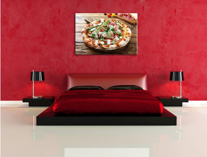 Pixxprint Prosciutto Pizza auf Holztisch als Leinwandbild/Grösse: 100x70 cm/Wandbild/Kunstdruck/fert