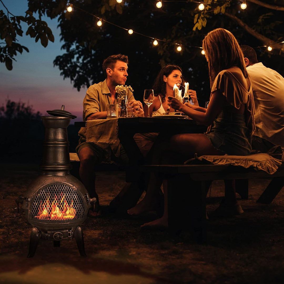 Relaxdays Terrassenofen, Aztekenofen mit Schürhaken, Gusseisen, Funkenschutz, für Garten, HxBxT: 86x