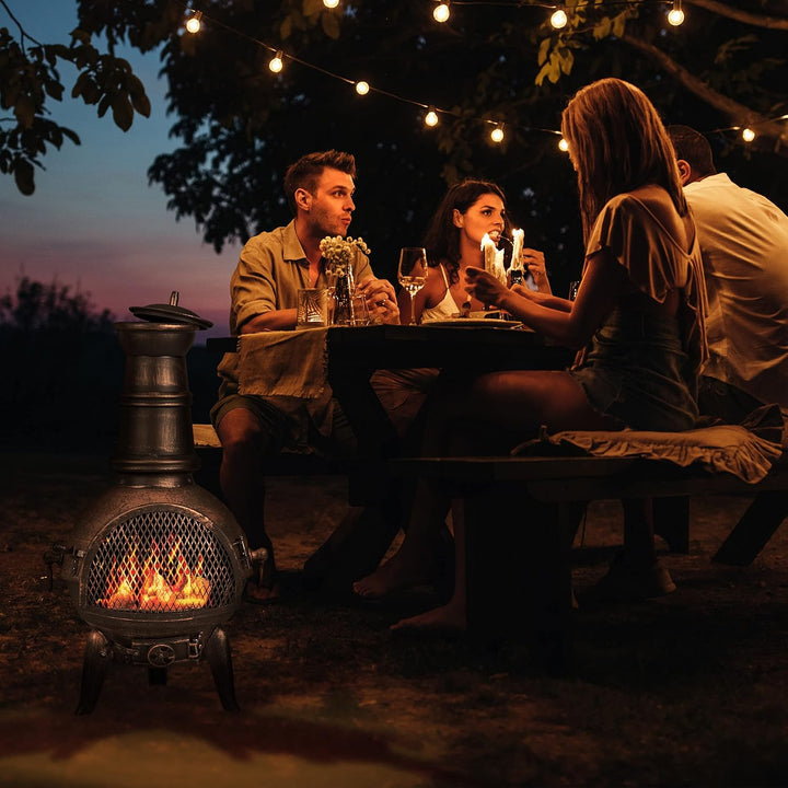 Relaxdays Terrassenofen, Aztekenofen mit Schürhaken, Gusseisen, Funkenschutz, für Garten, HxBxT: 86x