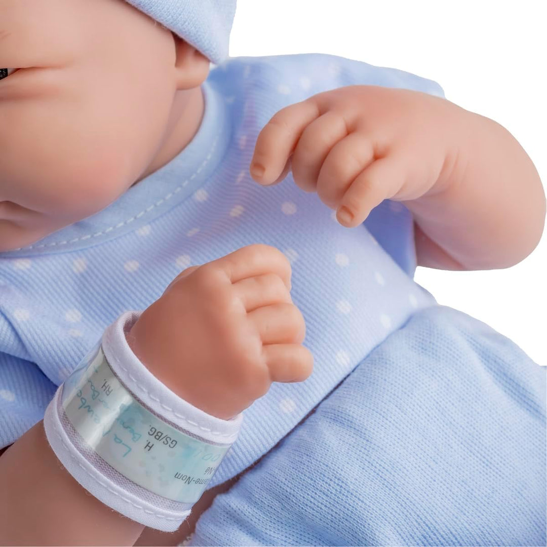 JC TOYS 102-18540 – Kinderpuppe, Körper aus Gummi, Blaue Kleidung mit Punkten, 36 cm