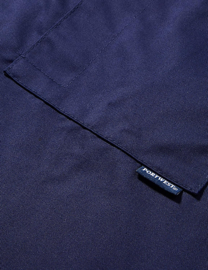 Portwest Standard-Kittel. Farbe: Marineblau. Grösse: L. C852NARL. L marine, L marine