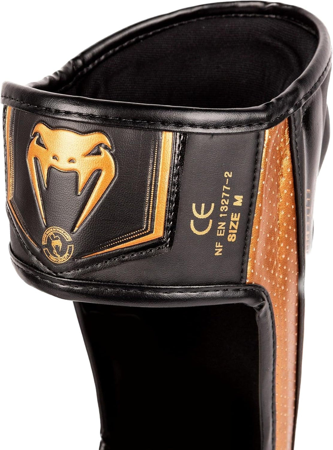 Venum Elite Evo Schienbeinschoner M Schwarz / Bronze, M Schwarz / Bronze