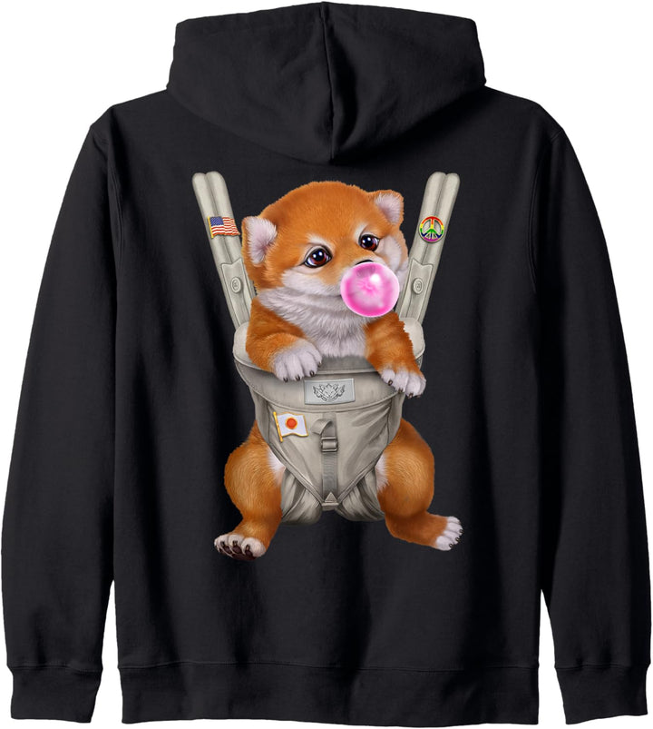 Roter Shiba Hund mit Kaugummi in der Babytrage Kapuzenjacke