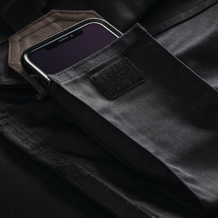 Scruffs Arbeitshose mit Holstertaschen „Pro Flex“, schwarz 30W / 30L, 30W / 30L