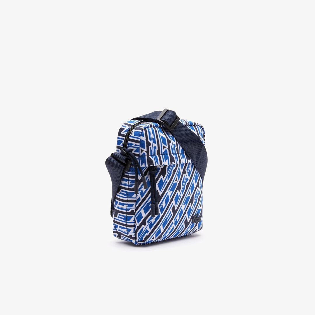 Lacoste Herren Umhängetasche VERTICAL CAMERA BAG,100% recyceltes Polyester Mono Grossbritannien, Wei