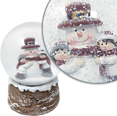 com-four® Weihnachtsschneekugel – Festliche Dekoration mit ansprechendem, glitzerndem Schneefall Fei