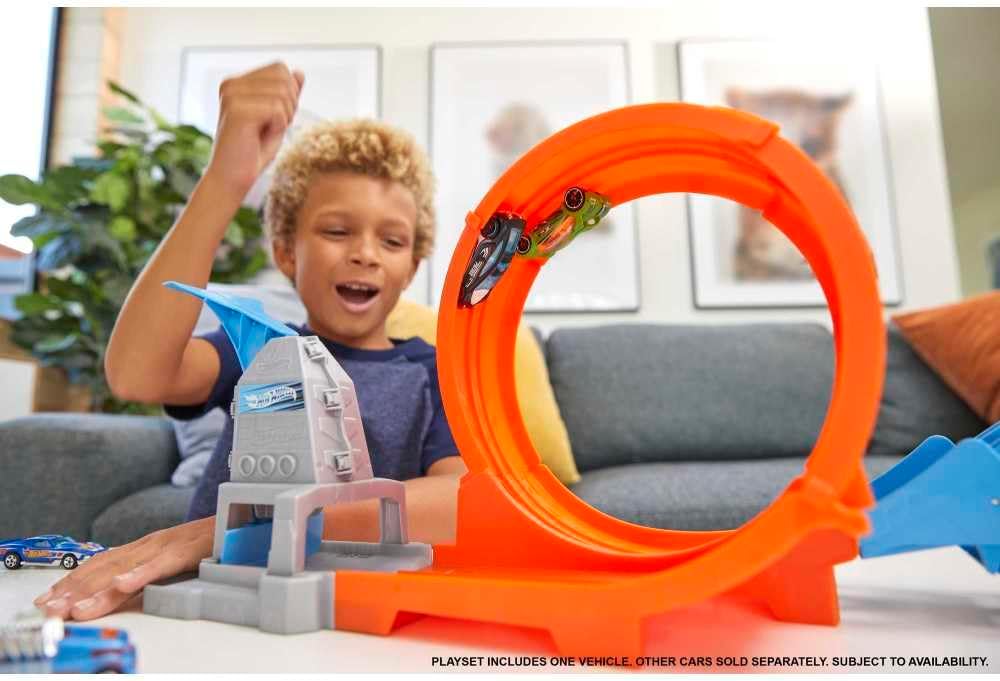 Hot Wheels GTV13 - Loop Stunt Champion Track-Set mit 1 Hot Wheels Fahrzeug im Massstab 1:64, Spielze