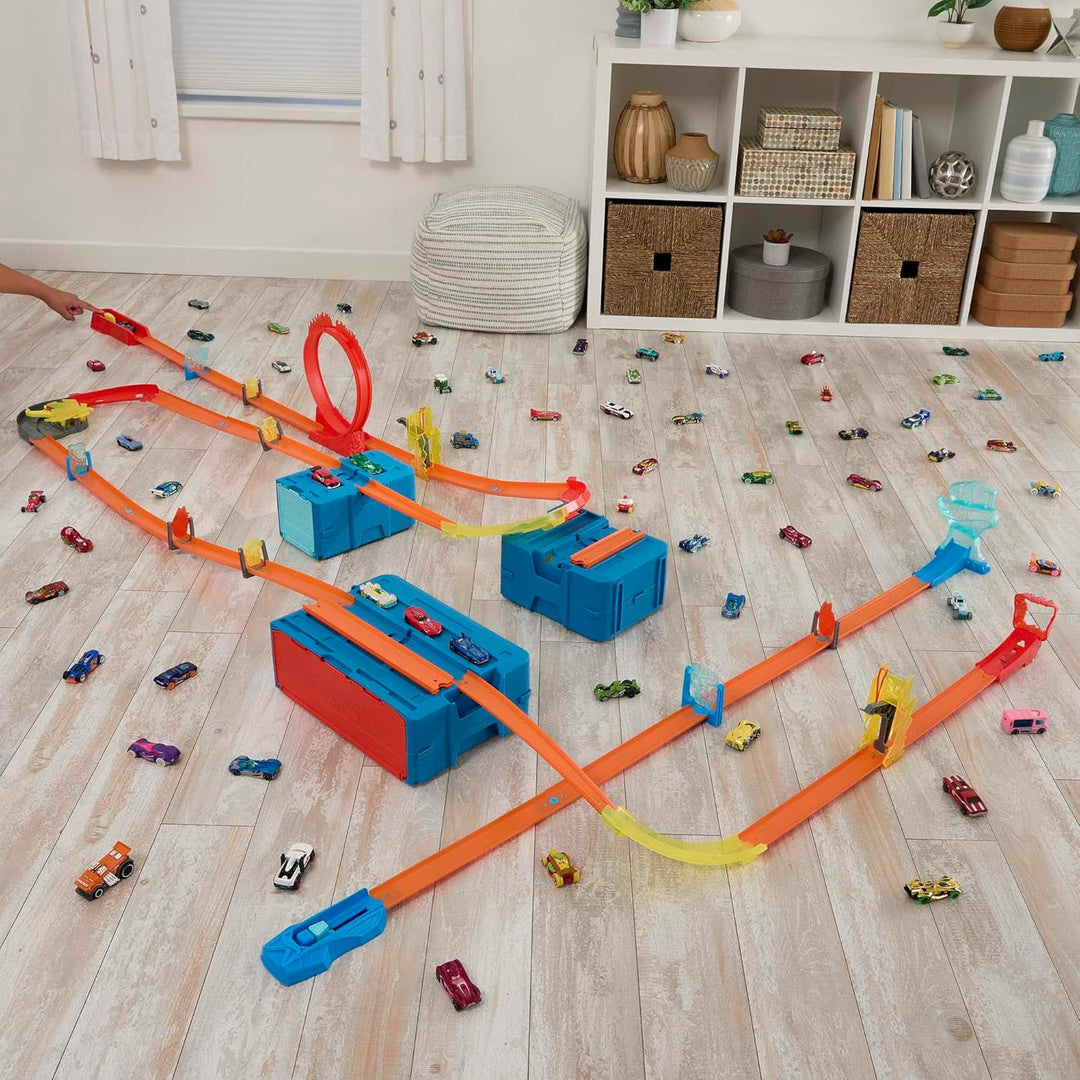 Hot Wheels Trackset mit 1 Hot Wheels Auto, 12 Track-Beschleunigungselementen, stapelbarer Spielzeuga