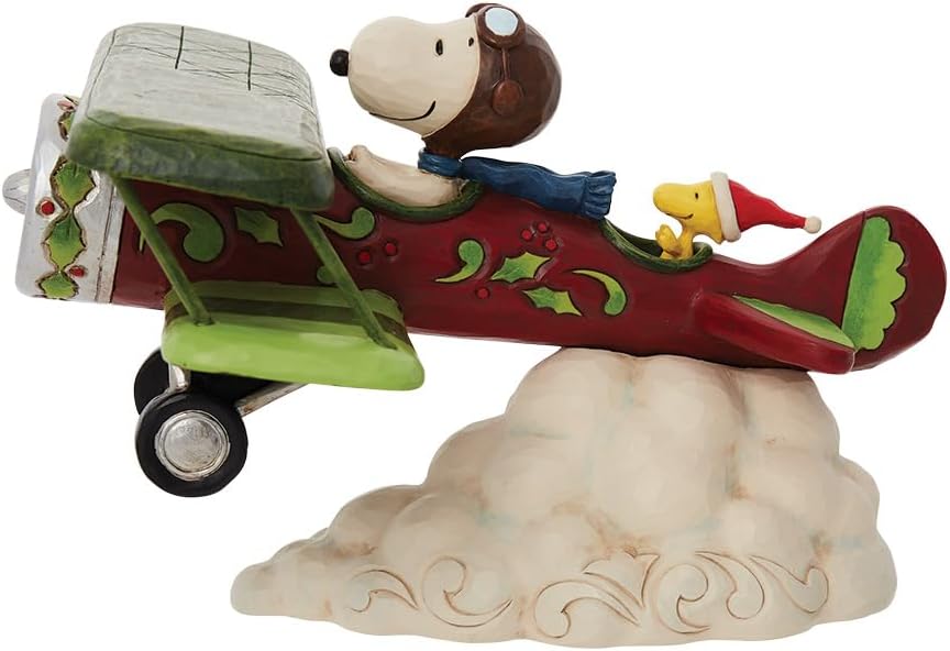 Enesco Jim Shore Peanuts Snoopy Flying Christmas Ace Flugzeug-Figur, 13 cm, mehrfarbig