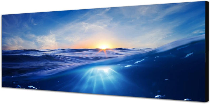 Paul Sinus Art Panoramabild auf Leinwand und Keilrahmen 150x50cm Meer Unterwasser Welle Sonnenunterg