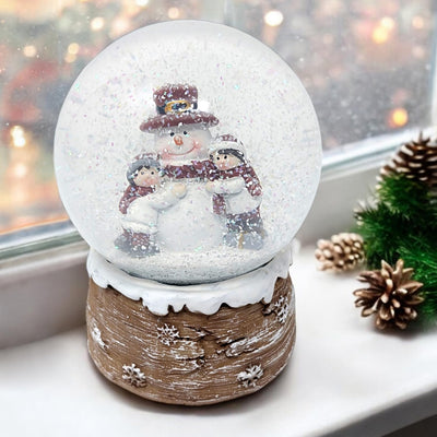 com-four® Weihnachtsschneekugel – Festliche Dekoration mit ansprechendem, glitzerndem Schneefall Fei