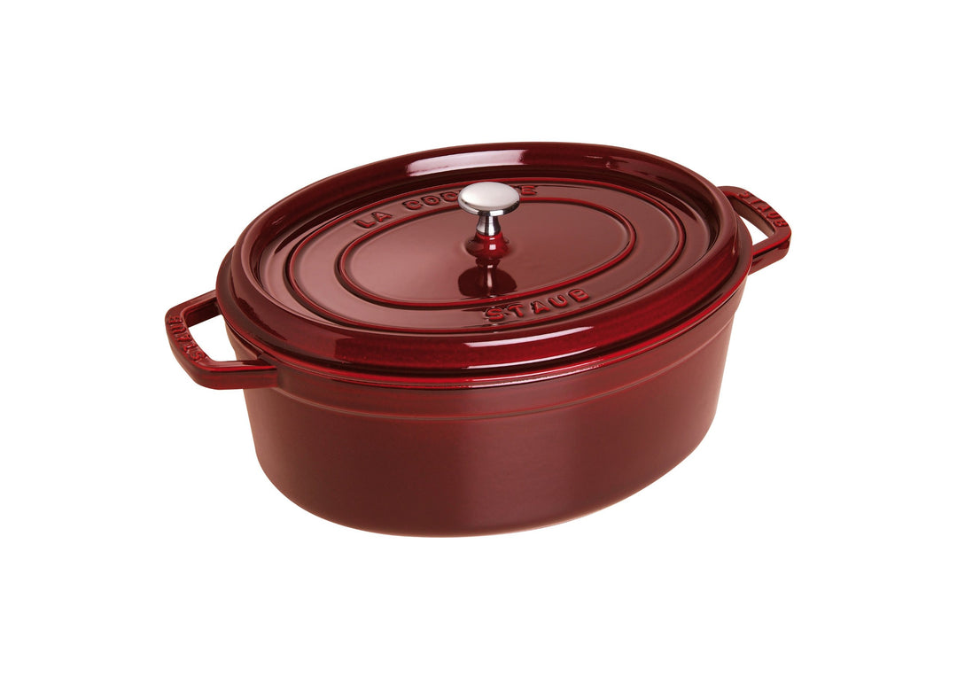 Staub 1102387 Cocotte, 23 cm oval, Bräter aus Gusseisen, grenadine, Grenadine