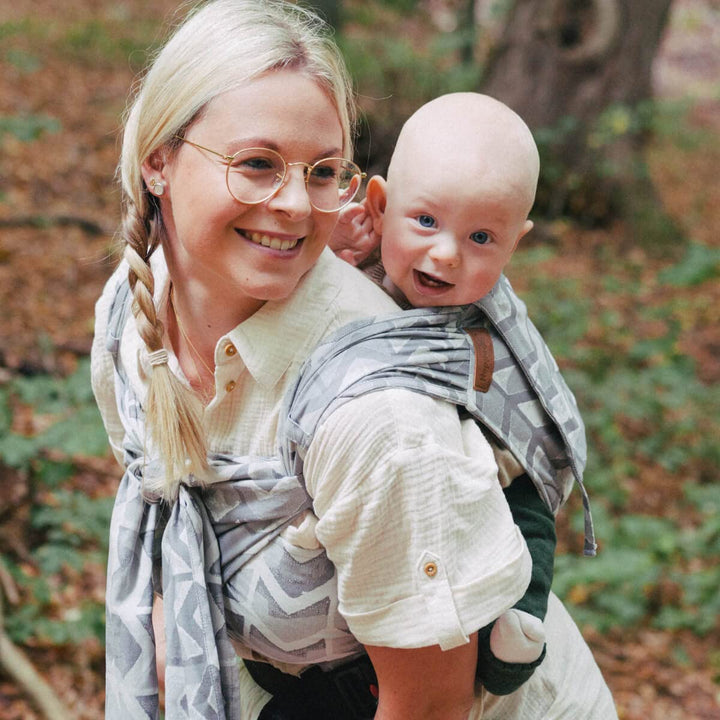 Hoppediz Hop-Tye Advanced - 4-in-1 Babytrage für Neugeborene ab Geburt - Halfbuckle Tragehilfe mit T