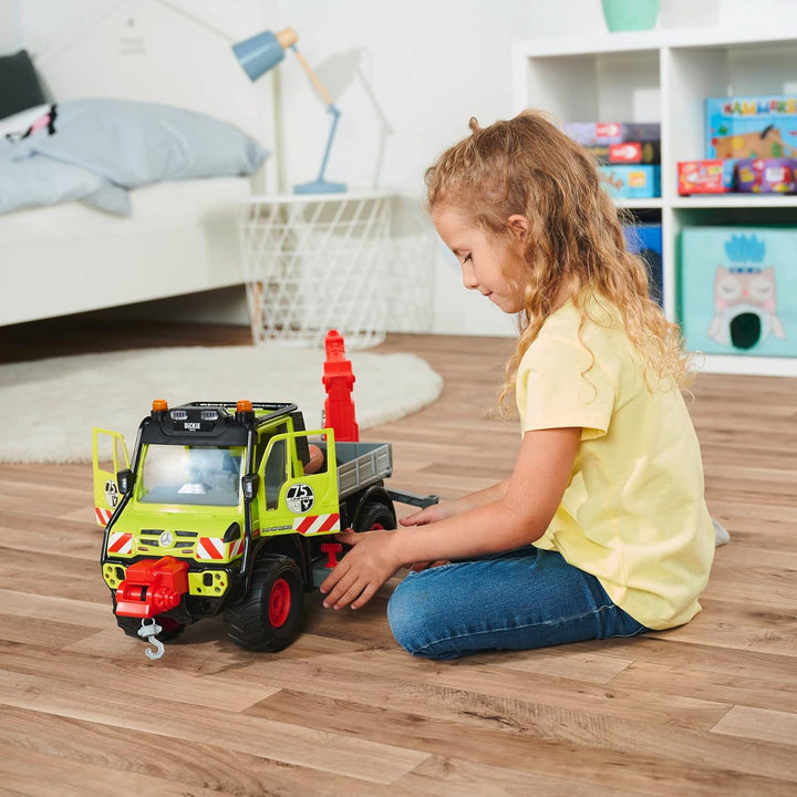 Dickie Toys - Unimog Holztransporter - mit elektrischer Seilwinde und Kranarm mit Joystick-Steuerung