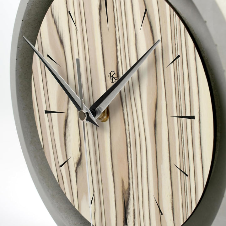 Kreative Feder Runde Tischuhr aus Beton im Industrial Design – leise Standuhr ohne Ticken in minimal