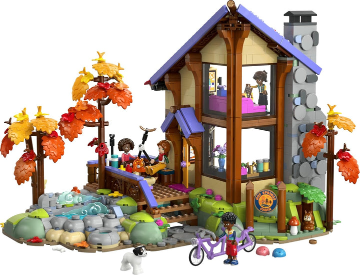 LEGO Friends Gemütliche Hütte im Herbstwald - Miniatur Spielhaus mit 4 Minifiguren, 2 Haustierfigure