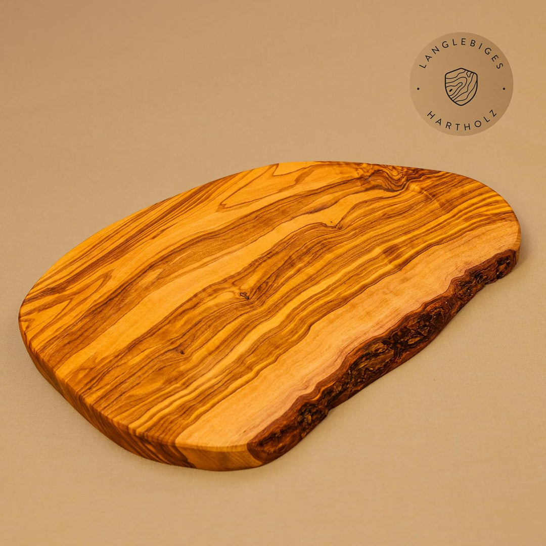 das Olivenholzbrett® Schneidebrett Olivenholz, Brotzeitbrett aus Holz mit naturbelassenem Rand, 25 c