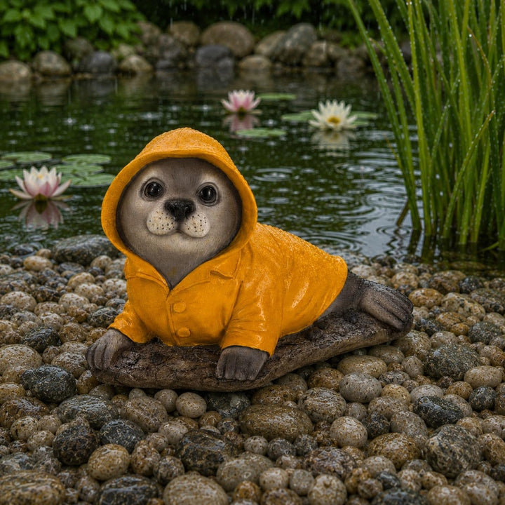 Gartenfigur für draussen, Teichdeko - Seehund, Robbe im Regenmantel, wetterfest - Deko Figur 21,5 cm