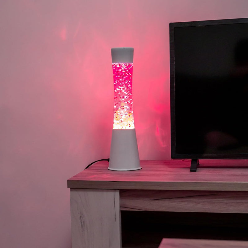 FISURA - Rosa Lavalampe. Weisser Sockel, rosa Flüssigkeit und glitzernde Herzen. Lampe mit Entspannu