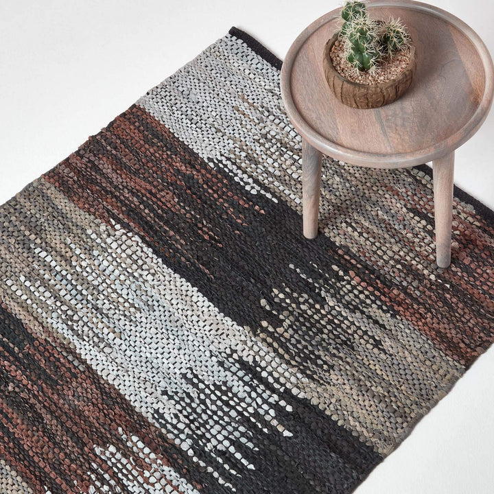Homescapes Teppich aus 100% recyceltem Leder, Cutshuttle-Lederteppich 120 x 180 cm, schwarz-braun-gr