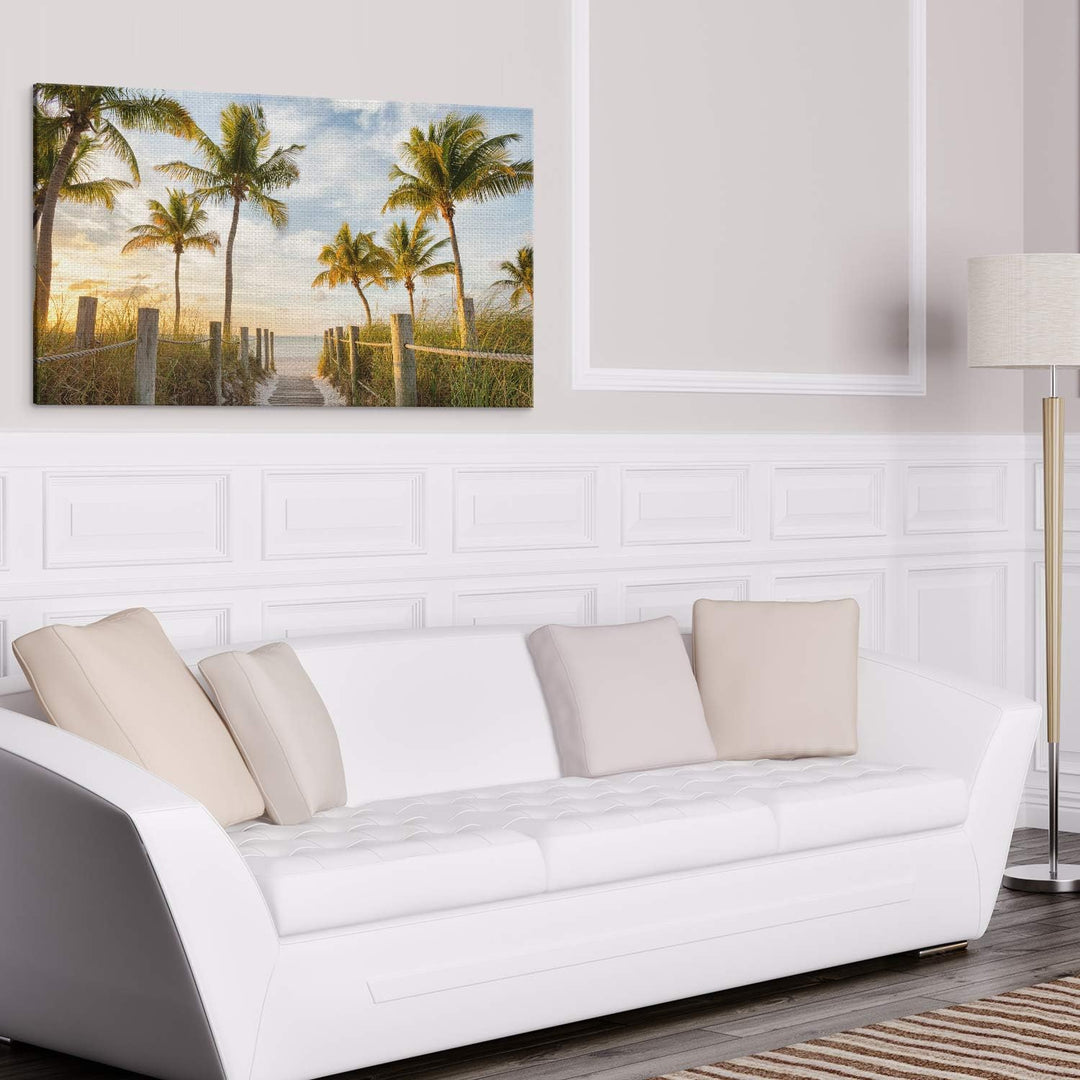 PICANOVA – Bild auf Leinwand Palmenweg zum Meer 100x50cm – Leinwandbild – Premium Leinwanddruck – Wa