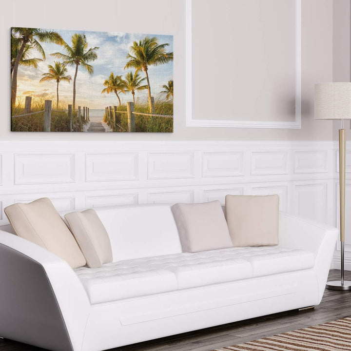 PICANOVA – Bild auf Leinwand Palmenweg zum Meer 100x50cm – Leinwandbild – Premium Leinwanddruck – Wa