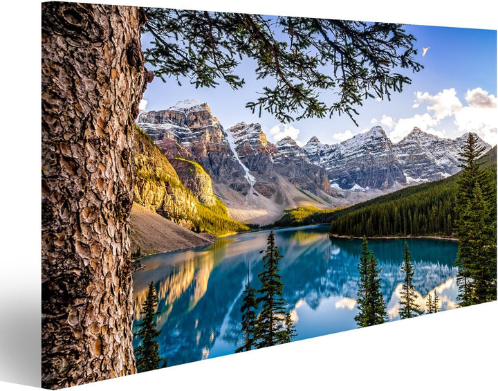 islandburner Bild auf Leinwand Landschaftsansicht des Morain Sees und des Gebirgszugs mit Baum im Vo
