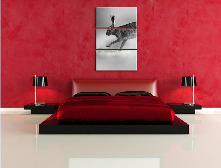 Pixxprint Springender Feldhase schwarz/weiss / 3-Teilig/Gesamtmass 120cm Leinwandbild bespannt auf H