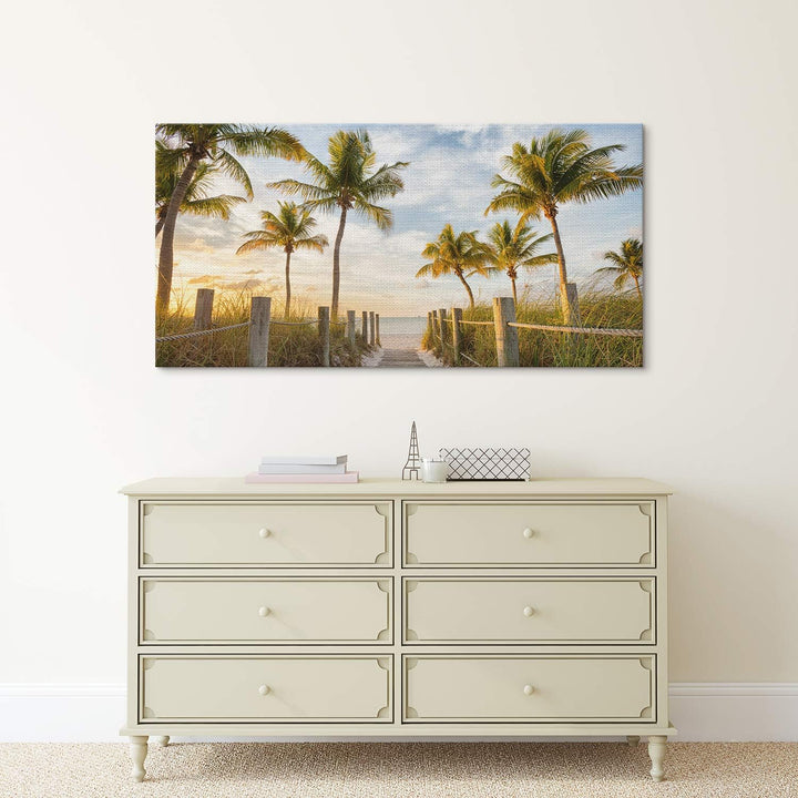 PICANOVA – Bild auf Leinwand Palmenweg zum Meer 100x50cm – Leinwandbild – Premium Leinwanddruck – Wa