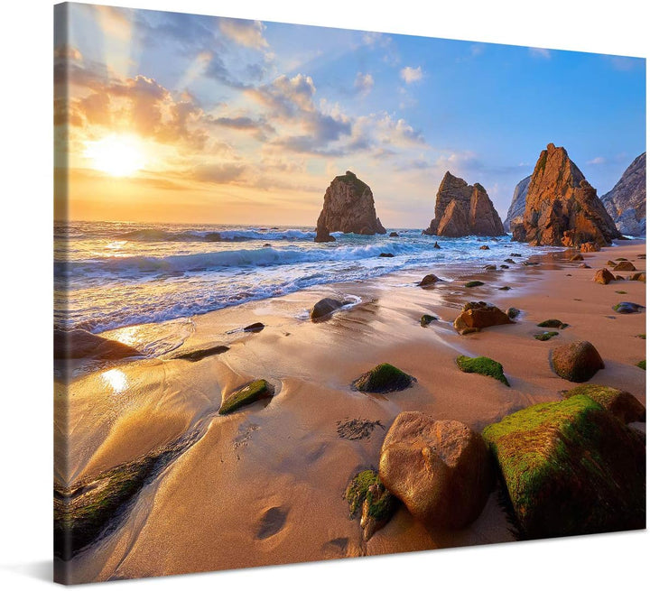 PICANOVA – Bild auf Leinwand Meeresstrand mit Felsen 100x75cm – Leinwandbild – Premium Leinwanddruck