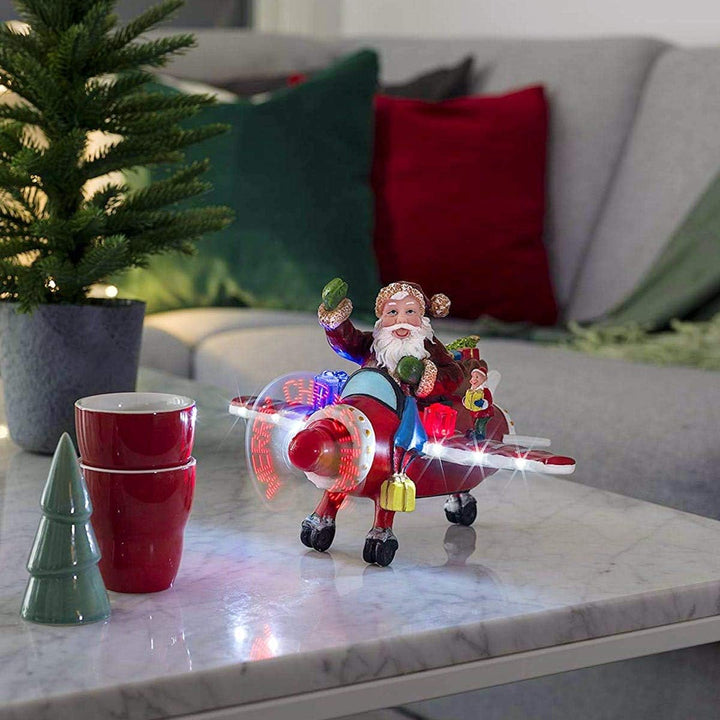 Konstsmide LED Szenerie Weihnachtsmann im Flugzeug, mit Animation, Geräuschsensor und 2 min Timer, 8