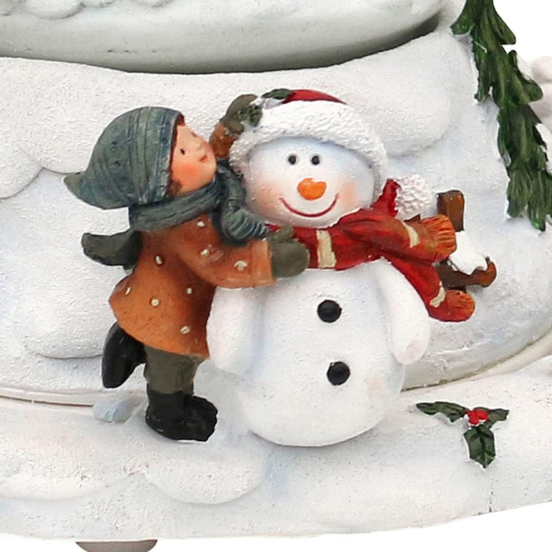 Dekohelden24 Schneekugel Kindern auf Schlitten, beweglicher Sockel mit Spielwerk, Melodie: Leise rie