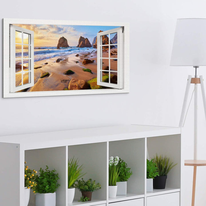 PICANOVA – Bild auf Leinwand Meeresstrand mit Felsen Fenster 100x50cm – Leinwandbild – Premium Leinw