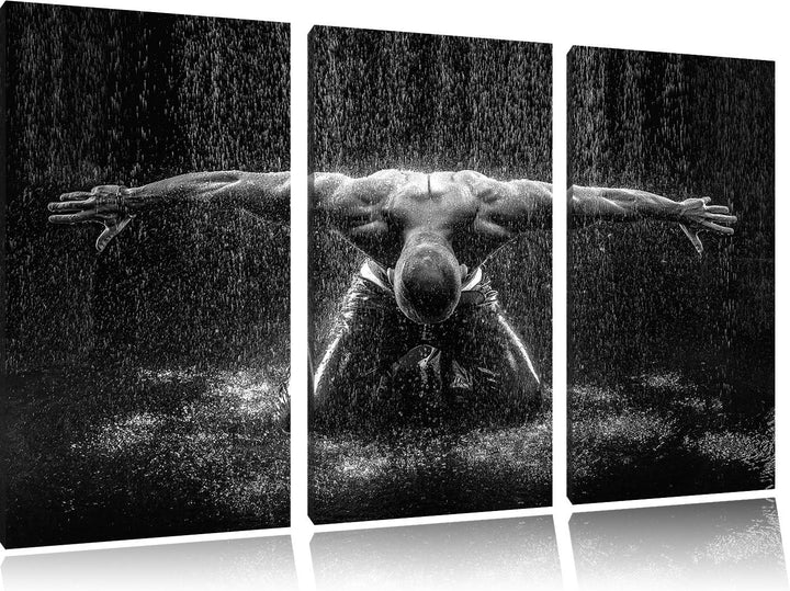 Pixxprint Bodybuilder im Regen Kunst B&W / 3-Teilig/Gesamtmass 120cm Leinwandbild bespannt auf Holzr