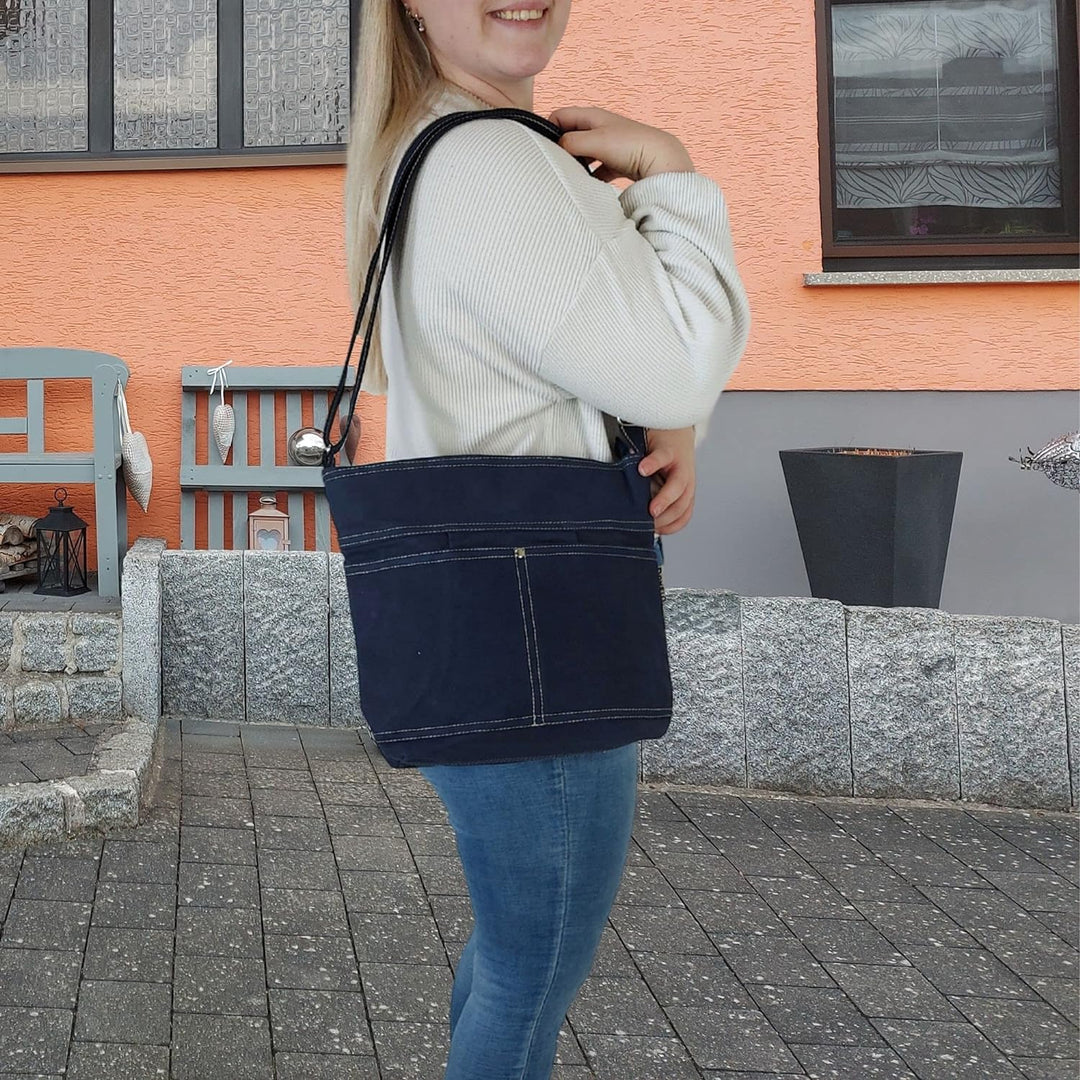 Domelo Damen Vegan Umhängetasche. Die nachhaltige Crossbody Hobo Tasche ist aus 100% Baumwolle/Canva