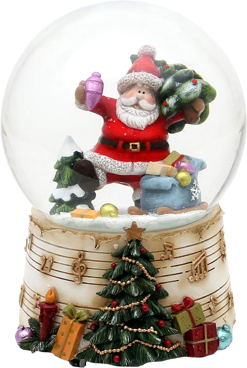 Dekohelden24 -fröhlicher Weihnachtsmann mit Geschenken und Tanne - auf Sockel mit Musiknoten und Spi