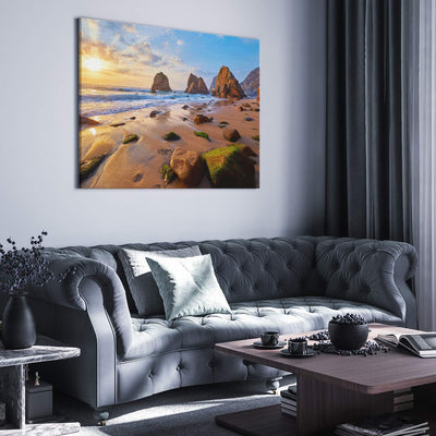 PICANOVA – Bild auf Leinwand Meeresstrand mit Felsen 100x75cm – Leinwandbild – Premium Leinwanddruck