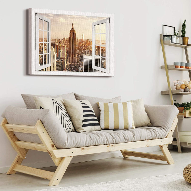 PICANOVA – Bild auf Leinwand Manhattan Empire State Building Fenster 100x75cm – Leinwandbild – Premi